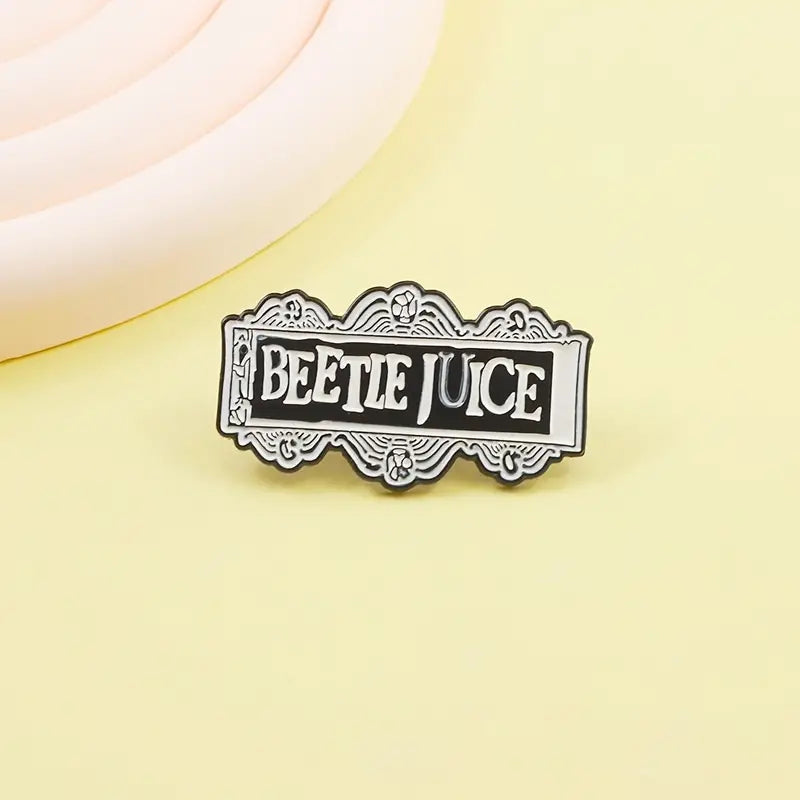 Beetle Juice enamel pin