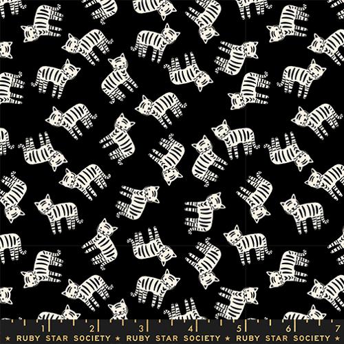 White striped cartoon cats scattered in different directions on black.