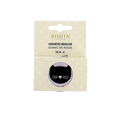 Bohin retractable tape measure with a black cat-face design in pale lavender housing, packaged and labeled 150 cm / 60 inches.